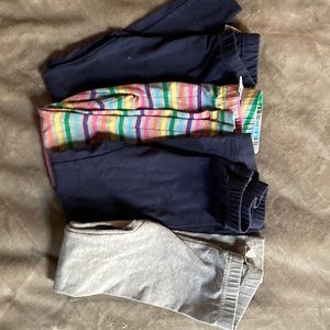 Lot of 4 110 leggings.  Gently used took a picture of a stains on grey and navy.